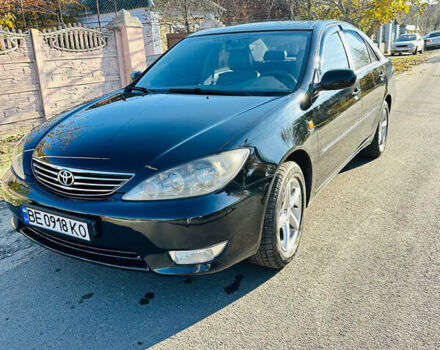 Черный Тойота Камри, объемом двигателя 2.4 л и пробегом 253 тыс. км за 6100 $, фото 11 на Automoto.ua