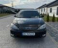 Чорний Тойота Камрі, об'ємом двигуна 3 л та пробігом 530 тис. км за 7500 $, фото 1 на Automoto.ua