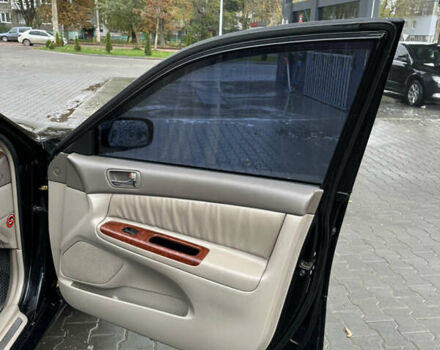 Чорний Тойота Камрі, об'ємом двигуна 2.4 л та пробігом 292 тис. км за 5350 $, фото 11 на Automoto.ua