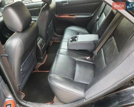 Чорний Тойота Камрі, об'ємом двигуна 3 л та пробігом 218 тис. км за 6400 $, фото 11 на Automoto.ua