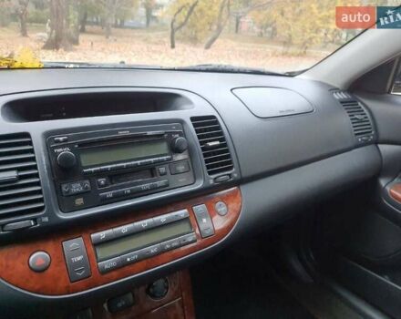 Чорний Тойота Камрі, об'ємом двигуна 3 л та пробігом 218 тис. км за 6400 $, фото 5 на Automoto.ua