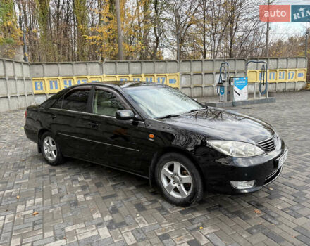 Черный Тойота Камри, объемом двигателя 2.4 л и пробегом 326 тыс. км за 6300 $, фото 8 на Automoto.ua