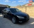 Чорний Тойота Камрі, об'ємом двигуна 2.4 л та пробігом 280 тис. км за 6900 $, фото 1 на Automoto.ua
