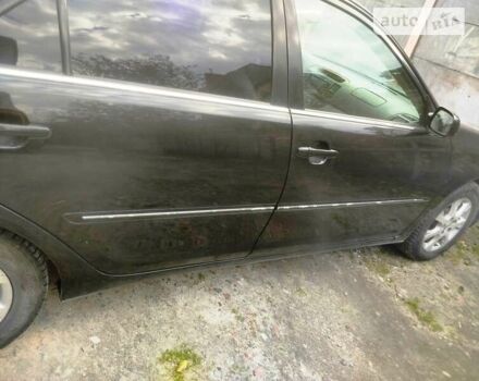 Чорний Тойота Камрі, об'ємом двигуна 3 л та пробігом 208 тис. км за 6700 $, фото 40 на Automoto.ua