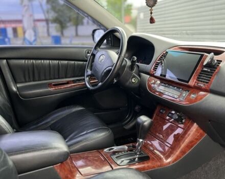 Черный Тойота Камри, объемом двигателя 2.4 л и пробегом 278 тыс. км за 5200 $, фото 7 на Automoto.ua