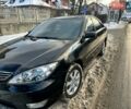 Черный Тойота Камри, объемом двигателя 3 л и пробегом 330 тыс. км за 6100 $, фото 1 на Automoto.ua