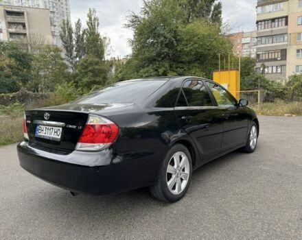 Черный Тойота Камри, объемом двигателя 2.4 л и пробегом 180 тыс. км за 6000 $, фото 2 на Automoto.ua