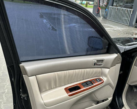 Чорний Тойота Камрі, об'ємом двигуна 2.4 л та пробігом 292 тис. км за 5350 $, фото 17 на Automoto.ua