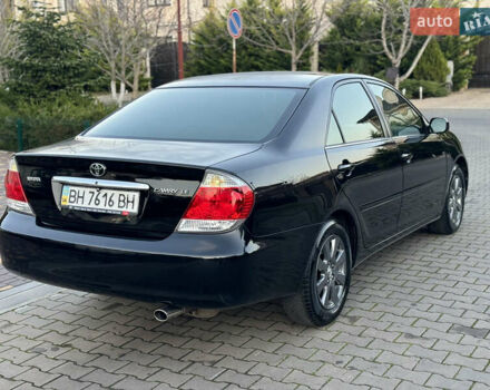 Черный Тойота Камри, объемом двигателя 2.36 л и пробегом 98 тыс. км за 8700 $, фото 22 на Automoto.ua