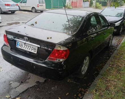 Черный Тойота Камри, объемом двигателя 2.36 л и пробегом 350 тыс. км за 4500 $, фото 2 на Automoto.ua