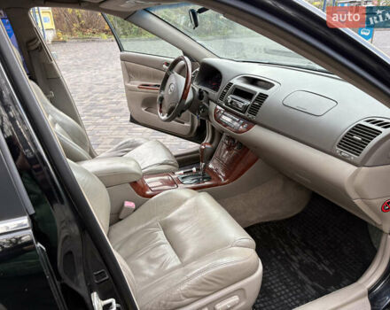 Черный Тойота Камри, объемом двигателя 2.4 л и пробегом 326 тыс. км за 6300 $, фото 15 на Automoto.ua