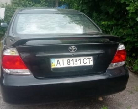 Черный Тойота Камри, объемом двигателя 2.4 л и пробегом 420 тыс. км за 5100 $, фото 1 на Automoto.ua