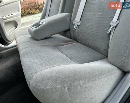 Черный Тойота Камри, объемом двигателя 2.36 л и пробегом 98 тыс. км за 8700 $, фото 62 на Automoto.ua