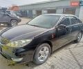 Черный Тойота Камри, объемом двигателя 2.36 л и пробегом 200 тыс. км за 7800 $, фото 1 на Automoto.ua