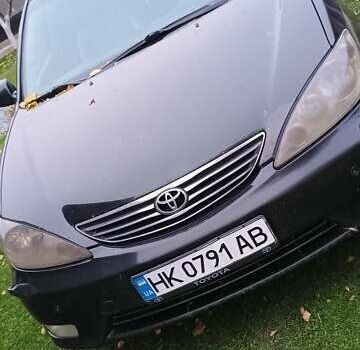 Чорний Тойота Камрі, об'ємом двигуна 2.4 л та пробігом 300 тис. км за 5500 $, фото 16 на Automoto.ua