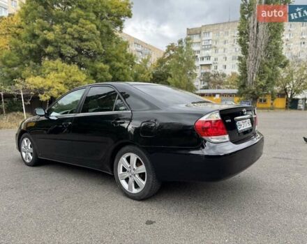 Чорний Тойота Камрі, об'ємом двигуна 2.36 л та пробігом 180 тис. км за 6000 $, фото 4 на Automoto.ua