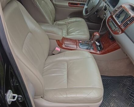 Черный Тойота Камри, объемом двигателя 2.4 л и пробегом 300 тыс. км за 5500 $, фото 7 на Automoto.ua
