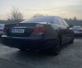 Черный Тойота Камри, объемом двигателя 2.4 л и пробегом 300 тыс. км за 7500 $, фото 4 на Automoto.ua