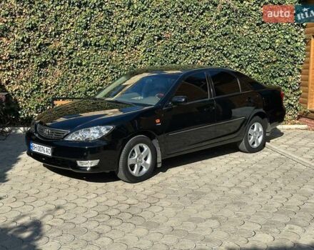 Черный Тойота Камри, объемом двигателя 2.36 л и пробегом 253 тыс. км за 6900 $, фото 2 на Automoto.ua