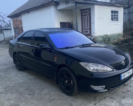 Черный Тойота Камри, объемом двигателя 2.4 л и пробегом 300 тыс. км за 7500 $, фото 8 на Automoto.ua