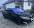 Черный Тойота Камри, объемом двигателя 2.4 л и пробегом 300 тыс. км за 7500 $, фото 8 на Automoto.ua