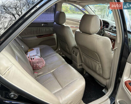 Черный Тойота Камри, объемом двигателя 2.4 л и пробегом 326 тыс. км за 6300 $, фото 17 на Automoto.ua