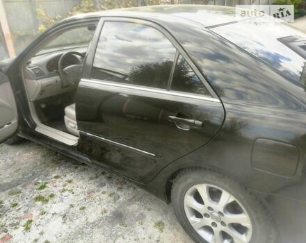 Чорний Тойота Камрі, об'ємом двигуна 3 л та пробігом 208 тис. км за 6700 $, фото 30 на Automoto.ua