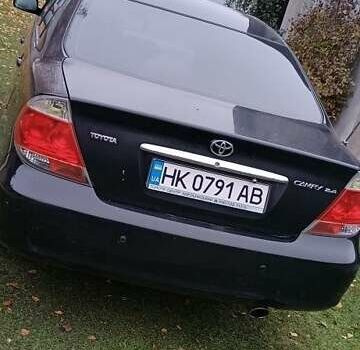 Чорний Тойота Камрі, об'ємом двигуна 2.4 л та пробігом 300 тис. км за 5500 $, фото 8 на Automoto.ua
