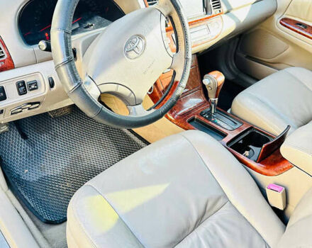 Черный Тойота Камри, объемом двигателя 2.4 л и пробегом 253 тыс. км за 6100 $, фото 10 на Automoto.ua