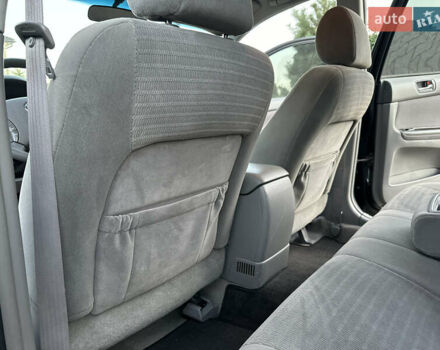 Черный Тойота Камри, объемом двигателя 2.36 л и пробегом 98 тыс. км за 8700 $, фото 63 на Automoto.ua