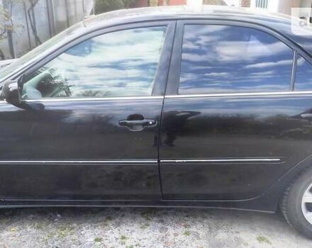 Чорний Тойота Камрі, об'ємом двигуна 3 л та пробігом 208 тис. км за 6700 $, фото 32 на Automoto.ua