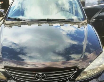 Чорний Тойота Камрі, об'ємом двигуна 3 л та пробігом 208 тис. км за 6700 $, фото 21 на Automoto.ua