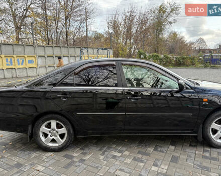 Черный Тойота Камри, объемом двигателя 2.4 л и пробегом 326 тыс. км за 6300 $, фото 6 на Automoto.ua