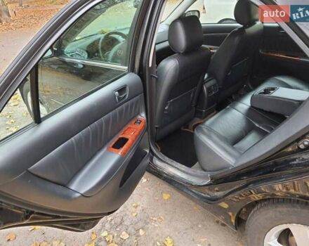 Чорний Тойота Камрі, об'ємом двигуна 3 л та пробігом 218 тис. км за 6400 $, фото 12 на Automoto.ua