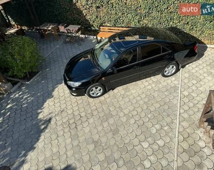 Черный Тойота Камри, объемом двигателя 2.36 л и пробегом 253 тыс. км за 6900 $, фото 1 на Automoto.ua