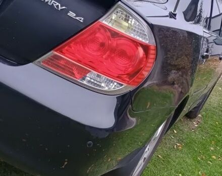 Черный Тойота Камри, объемом двигателя 2.4 л и пробегом 300 тыс. км за 5500 $, фото 3 на Automoto.ua