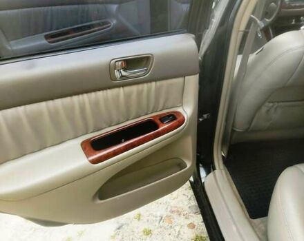 Чорний Тойота Камрі, об'ємом двигуна 3 л та пробігом 208 тис. км за 6700 $, фото 6 на Automoto.ua