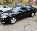Чорний Тойота Камрі, об'ємом двигуна 3 л та пробігом 218 тис. км за 6400 $, фото 4 на Automoto.ua