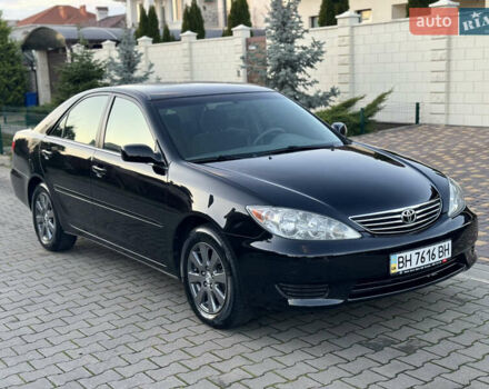 Черный Тойота Камри, объемом двигателя 2.36 л и пробегом 98 тыс. км за 8700 $, фото 29 на Automoto.ua