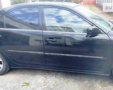 Чорний Тойота Камрі, об'ємом двигуна 3 л та пробігом 208 тис. км за 6700 $, фото 33 на Automoto.ua