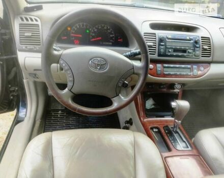 Чорний Тойота Камрі, об'ємом двигуна 3 л та пробігом 208 тис. км за 6700 $, фото 5 на Automoto.ua