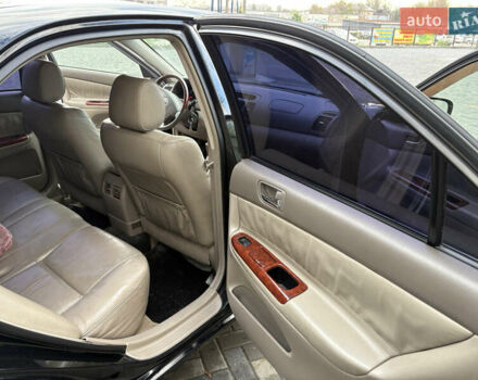 Черный Тойота Камри, объемом двигателя 2.4 л и пробегом 326 тыс. км за 6300 $, фото 16 на Automoto.ua