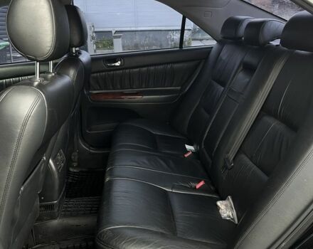 Черный Тойота Камри, объемом двигателя 2.4 л и пробегом 278 тыс. км за 5200 $, фото 12 на Automoto.ua