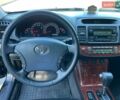 Чорний Тойота Камрі, об'ємом двигуна 2.4 л та пробігом 267 тис. км за 6900 $, фото 9 на Automoto.ua