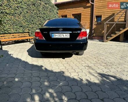Черный Тойота Камри, объемом двигателя 2.36 л и пробегом 253 тыс. км за 6900 $, фото 13 на Automoto.ua