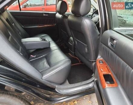 Чорний Тойота Камрі, об'ємом двигуна 3 л та пробігом 218 тис. км за 6400 $, фото 2 на Automoto.ua