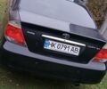 Черный Тойота Камри, объемом двигателя 2.4 л и пробегом 300 тыс. км за 5500 $, фото 1 на Automoto.ua