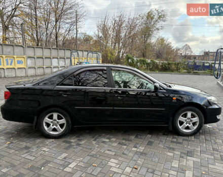 Черный Тойота Камри, объемом двигателя 2.4 л и пробегом 326 тыс. км за 6300 $, фото 7 на Automoto.ua