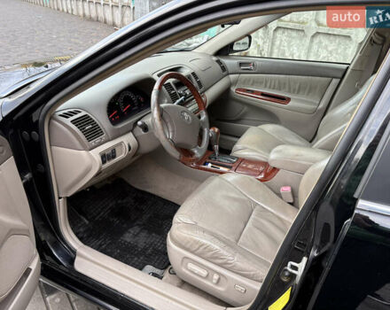 Черный Тойота Камри, объемом двигателя 2.4 л и пробегом 326 тыс. км за 6300 $, фото 10 на Automoto.ua