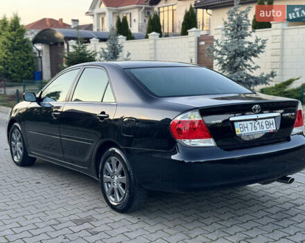 Черный Тойота Камри, объемом двигателя 2.36 л и пробегом 98 тыс. км за 8700 $, фото 13 на Automoto.ua